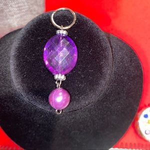 Unique purple beads/rhinestones/silver pendant